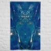 A blue wall hanging with an abstract image of water.