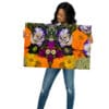 A woman holding up an image of flowers.