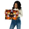 A woman holding up a picture of flowers.