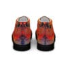 A pair of shoes with an orange and blue design on them.