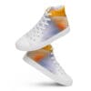 A pair of white shoes with an orange and blue design.
