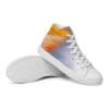 A pair of shoes with an orange and blue background.