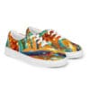 A pair of shoes with colorful painting on them.