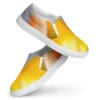 A pair of yellow shoes with white soles