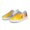 A pair of shoes with yellow and white design on them.