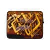 A laptop case with some gold and purple letters