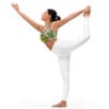 A woman in white pants and top doing yoga.
