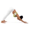 A woman is doing yoga on the floor