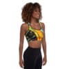 Woman in colorful sports bra.