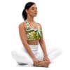 A woman sitting in the middle of her yoga pose.