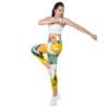 Woman in colorful yoga pants stretching.