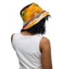 Woman wearing colorful bucket hat.