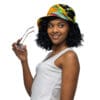 Woman in colorful hat holding sunglasses.
