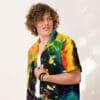 Man in vibrant psychedelic print shirt.