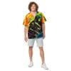 Man in colorful abstract shirt and shorts.
