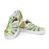 A pair of shoes with green and white leaves.