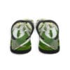 A pair of flip flops with a picture of leaves.