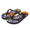 A pair of flip flops with flowers on them.