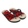 A pair of red flip flops with white soles.