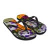 A pair of flip flops with flowers on them.