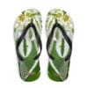A pair of flip flops with a picture of flowers.