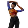 Woman in colorful top and jeans.