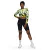Model in floral crop top and shorts.