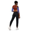 Woman in patterned top and jeans.