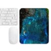 Blue nebula mousepad with keyboard.