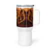 White travel mug with gold design.