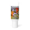 White tumbler with colorful flower design.