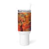 Abstract art tumbler with straw.