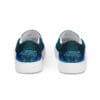 Here's an alt tag for the image: Blue slip-on sneakers, "Universe Within" design.