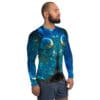 Man in blue ocean-themed rash guard.