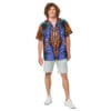 Man wearing colorful button-up shirt and shorts.