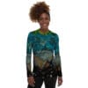 Woman in long-sleeve shirt, galaxy print.