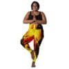 Woman in red and yellow leggings.