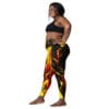 Woman in vibrant yellow and red leggings.