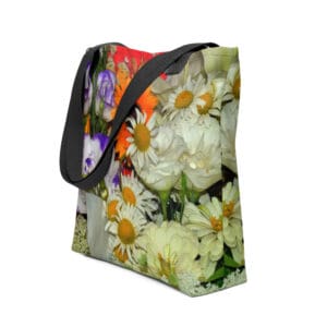 Floral tote bag with black straps.