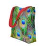 Red tote bag with peacock feather design.