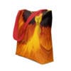 Red-handled tote bag with pansy print.
