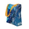 Blue galaxy tote bag with yellow straps.