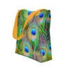 Peacock feather tote bag with orange straps.