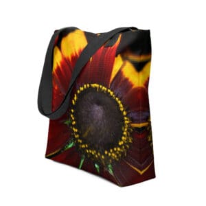 Tote bag with red and yellow flower.