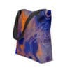 Abstract art tote bag with black straps.