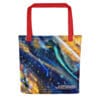 Red tote bag with abstract art.