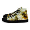A pair of shoes with yellow and brown abstract designs.