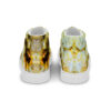 A pair of shoes with yellow and white designs on them.