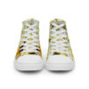 A pair of shoes with yellow and white pattern.