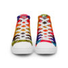 A pair of colorful shoes with white laces.